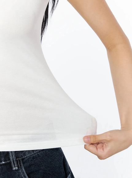 Silky Round Neck Tank Top IL509 White detail close-up model pulling hem showing stretch and fabric elasticity smooth soft material