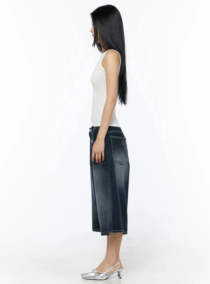 Silky Round Neck Tank Top IL509 White side shot model standing profile view fitted tank top silhouette with wide-leg dark denim culottes and silver heels