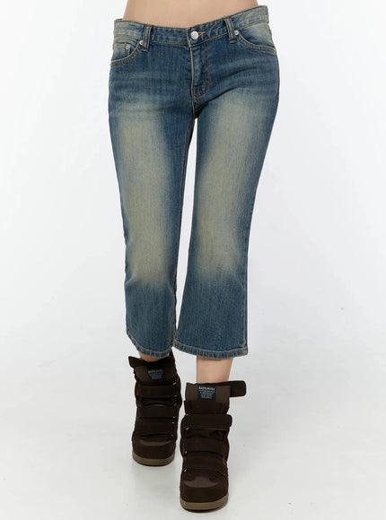 Simi Vintage Washed Capri Jeans IU524 Dark blue front waist-to-hem shot on model, highlighting low-rise waistband, silver button, faded denim, and flare silhouette