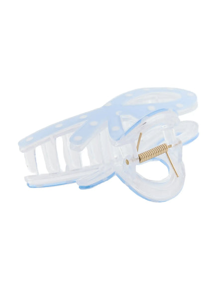 Sky Ribbon Hair Pin IL514 light blue close-up detail of claw clip interior showing gold spring pin and clear acrylic grip teeth from below