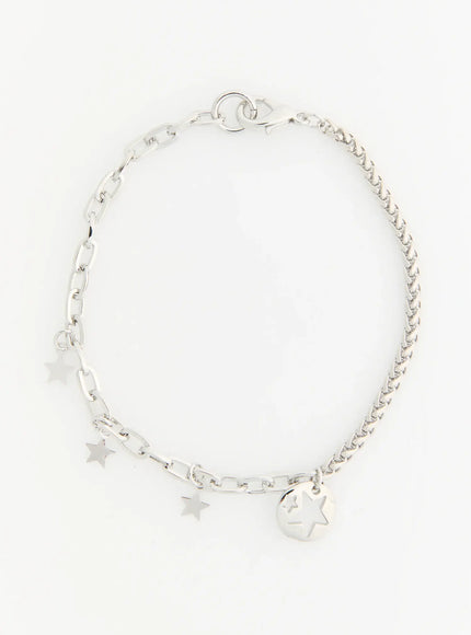 Skye Star Cut Bracelet IL522 silver flat-lay full view showing mixed chain design with star charms coin pendant and lobster clasp on white background