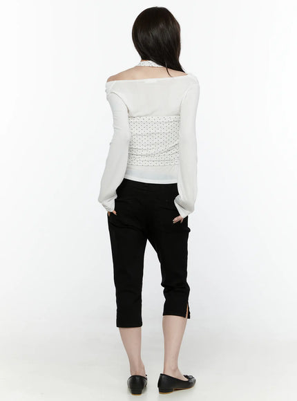 Slim Capri Pants IL521 Black back view on model in white off-shoulder top showing rear waistband, back pockets and hem slit detail