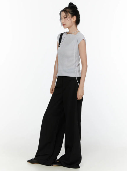 Slim Fit Boat Neck Knit Top CL520 Gray side-profile full-body shot on model, ribbed knit cap sleeve top with string choker tie, side seam and drawstring hem visible, styled with black wide-leg pants