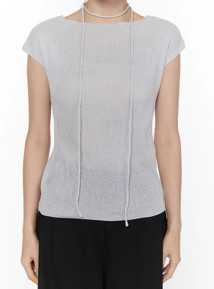 Slim Fit Boat Neck Knit Top CL520 Gray detail close-up on model torso, highlighting ribbed knit fabric, center front seam lines, string choker detail at neckline, and drawstring at hem