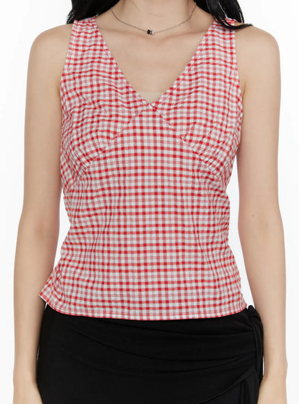 Slim Fit Plaid Sleeveless Top CL520 Red close-up detail shot on model highlighting V-neckline and gingham woven texture with fitted bodice