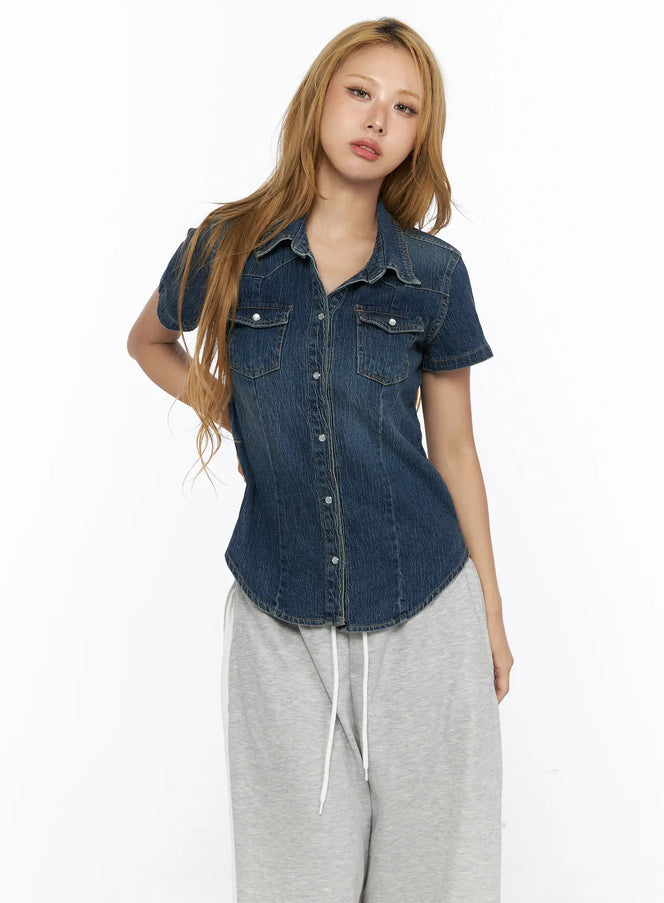 Slim Fit Wrinkle Wash Short Sleeve Jean Shirt CL528 Blue front shot on model standing upright showing snap buttons dual chest pockets and fitted denim silhouette