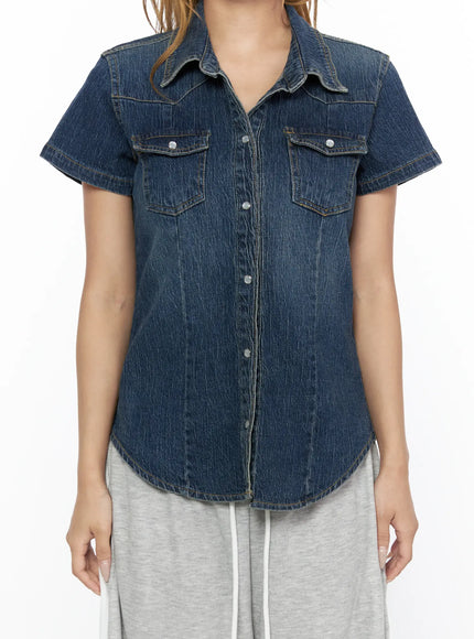 Slim Fit Wrinkle Wash Short Sleeve Jean Shirt CL528 Blue close-up front detail shot on model showing dual chest pockets silver snap buttons and wrinkle wash denim