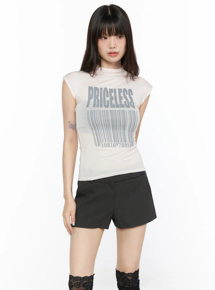 Slim Mock Neck Sheer Graphic Tee CL523 Light pink front shot on model standing arms relaxed showing full PRICELESS barcode graphic sleeveless top