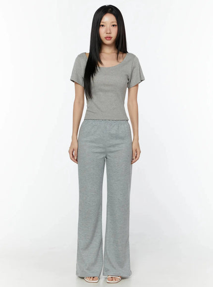 Slim U-Neck Short Sleeve Tee IU524 Gray full-length front shot on model standing straight, paired with gray wide-leg sweatpants, heeled sandals