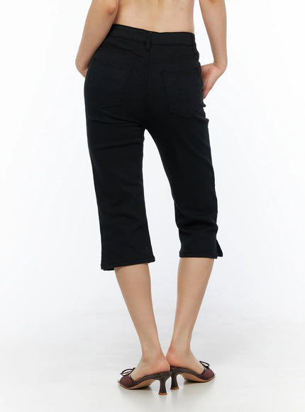 Slit Cotton Capri Trousers CL502 Black back view on model showing rear pockets, waistband, and hem slit