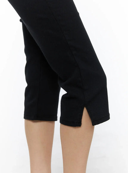 Slit Cotton Capri Trousers CL502 Black close-up detail shot of hem slit and cropped leg opening on model