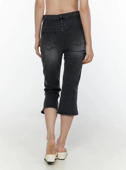 Slit Detail Capri Jeans CL521 washed black back view on model showing dual patch pockets faded wash slightly flared cropped hem with white mules