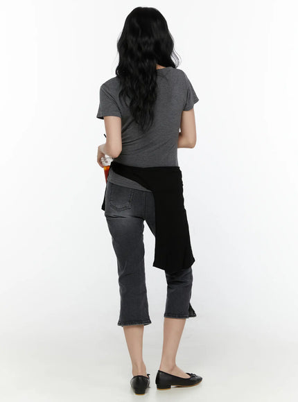 Slit Detail Capri Jeans CL521 washed black back full-body view on model with grey tee black tied cardigan showing back pockets and slit hem