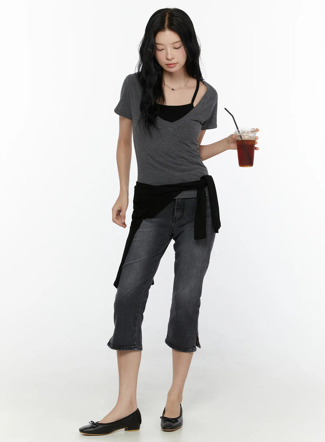 Slit Detail Capri Jeans CL521 washed black full-body front on model styled with grey tee black cardigan tied at waist and ballet flats