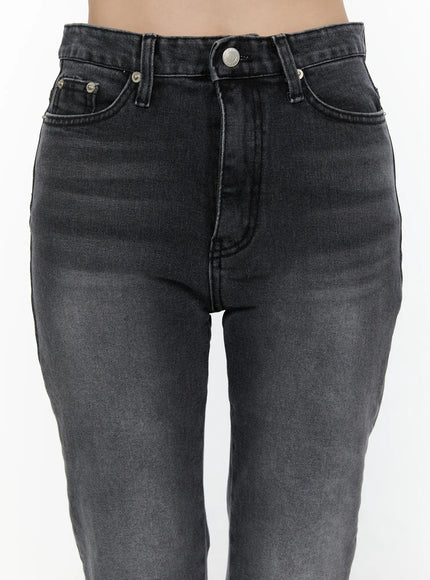 Slit Detail Capri Jeans CL521 washed black close-up detail of high-rise waistband front pockets silver button and faded denim texture