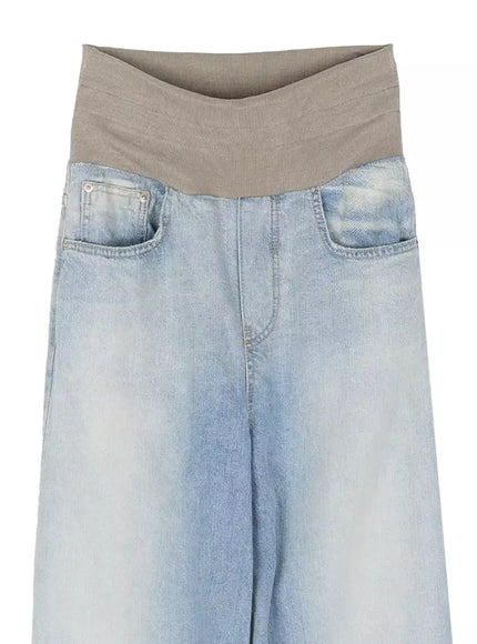 Solene Vintage Washed Foldover Baggy Jeans IU524 Blue close-up flat-lay front waist detail showing khaki ribbed foldover waistband front pockets and washed denim texture