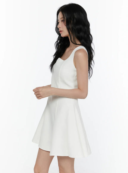 Square Neck A-Line Mini Dress CL520 white side shot on model without accessories showing sleeveless silhouette and flared skirt seam detail