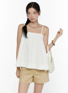LEWKIN Square Neck Babydoll Cami Top CL520 White front shot on model wearing beige shorts and carrying cream bag, S/M