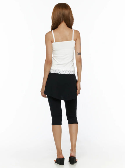 Square Neck Lace Cami CL503 White back view on model showing straight back cut, lace-trimmed spaghetti straps, floral lace hem, styled with black skirt-legging