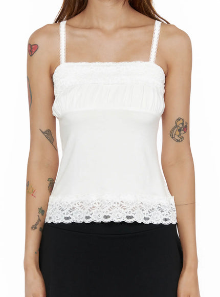 Square Neck Lace Cami CL503 White close-up front on model torso showing ruched square neckline, lace trim detail at bust and wide floral lace hem edge