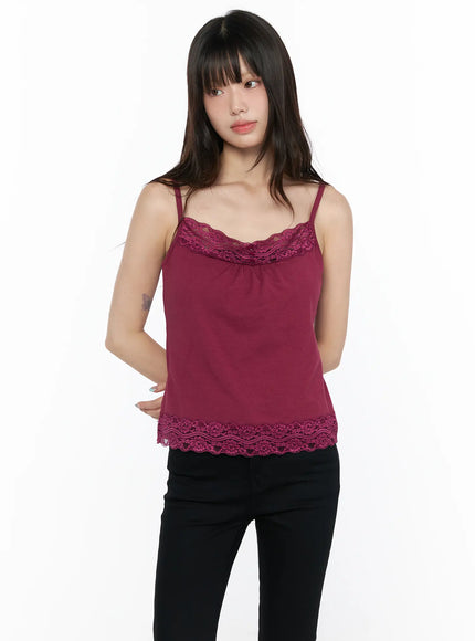 Square Neck Lace Tank CL522 front view on model in burgundy colorway, lace scallop neckline with button detail, paired with black pants