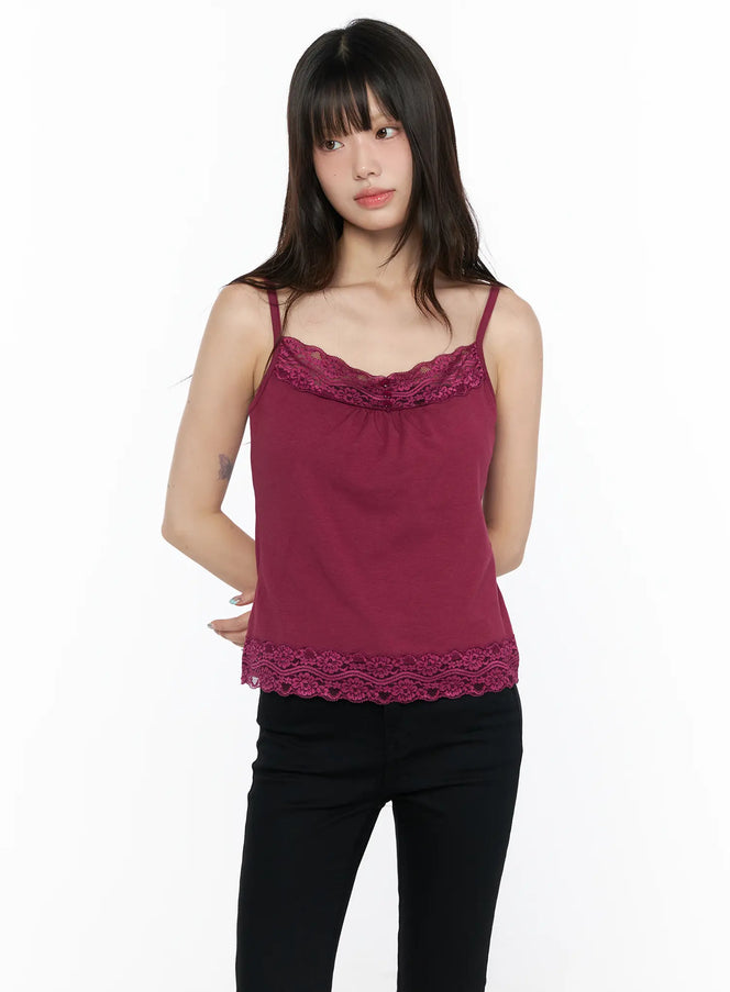 Square Neck Lace Tank CL522 front view on model in burgundy colorway, lace scallop neckline with button detail, paired with black pants