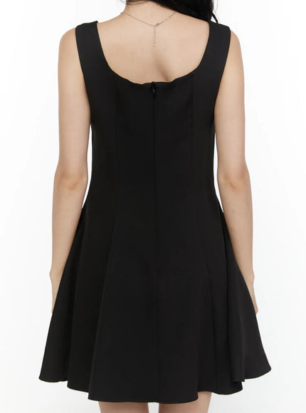 Square Neck Mini Dress CL521 Black back close-up shot on model showing scoop back neckline, center back zip closure, and flared skirt