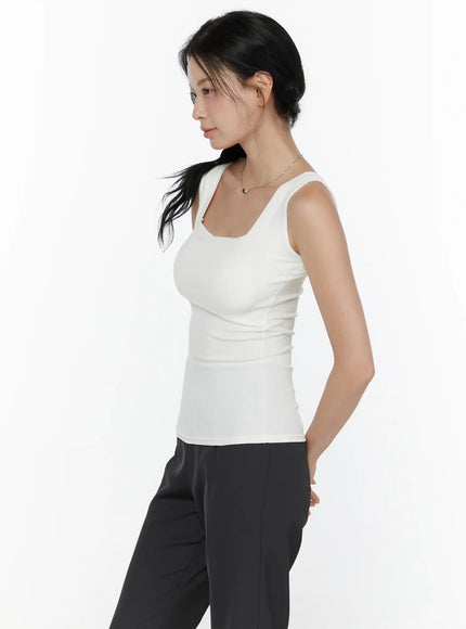 Square Neck Padded Ribbed Tank Top CL520 White side shot model upright hands behind back ribbed texture and fitted waist profile visible