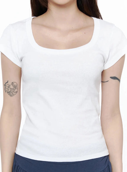 Square Neck Short Sleeve Tee IL502 White close-up front detail shot on model showing square neckline shape, ribbed cotton texture, and slim cropped fit
