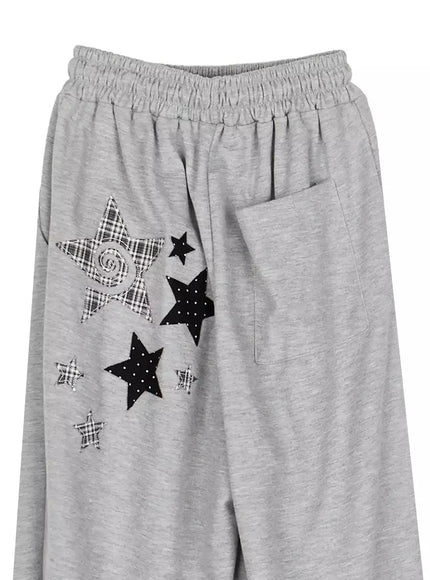 Star Graphic Wide Leg Sweatpants IL506 Gray flat-lay close-up of waist and thigh showing plaid and polka-dot mixed star appliqués and back pocket