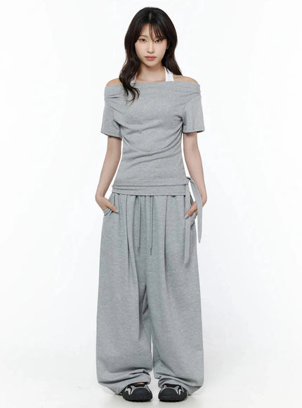 Star Graphic Wide Leg Sweatpants IL506 Gray front shot on model styled with off-shoulder top and drawstring waistband wide leg silhouette