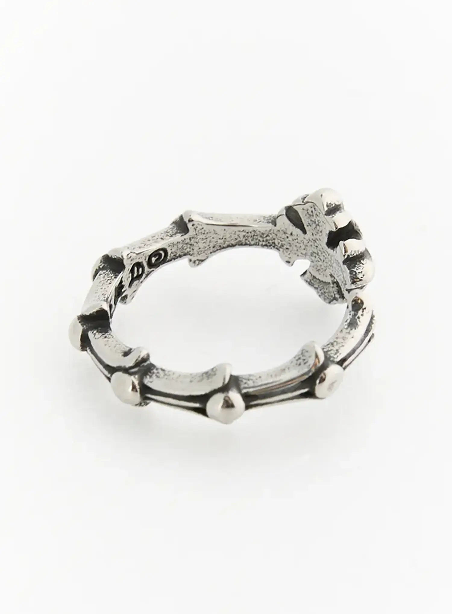 Stella Linked Cross Ring IL517 silver top overhead view showing full circular band with repeating cross links and hallmark stamp on inner shank
