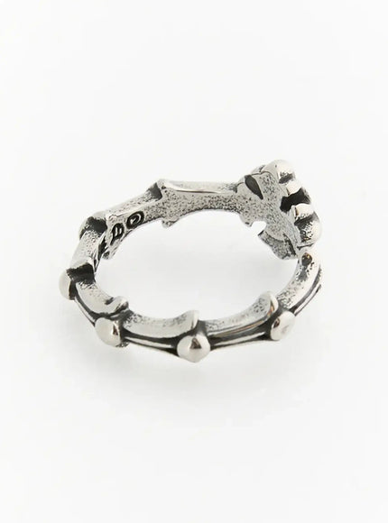 Stella Linked Cross Ring IL517 silver top overhead view showing full circular band with repeating cross links and hallmark stamp on inner shank