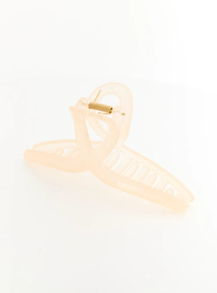 Stella Litter Hair Clip IL503 beige angled side shot showing open claw position with crossed-loop handle and exposed gold coil spring hinge