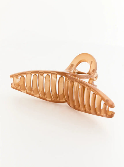 Stella Litter Hair Clip IL503 brown side close-up shot highlighting elongated ribbed claw body with rounded loop handle and gold spring detail