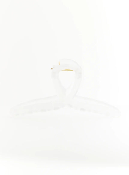 Stella Litter Hair Clip IL503 clear front view minimalist shot showing translucent loop handle with gold coil spring hinge on white background