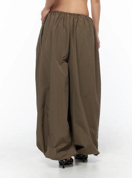 String Detail Parachute Pants CU524 Brown back shot on model showing elastic ruched waistband and voluminous wide-leg parachute fabric