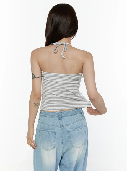 Stripe Halter Sleeveless Top CL507 Gray back shot on model showing open back design with knotted halter neck tie and gray white horizontal stripe ribbed fabric