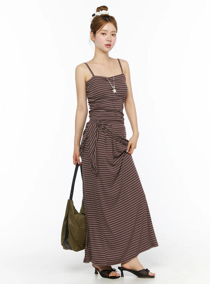 Striped Button Cami Top CL502 Brown full-length front shot on model with bun updo, star necklace and olive tote bag, maxi skirt with side tie