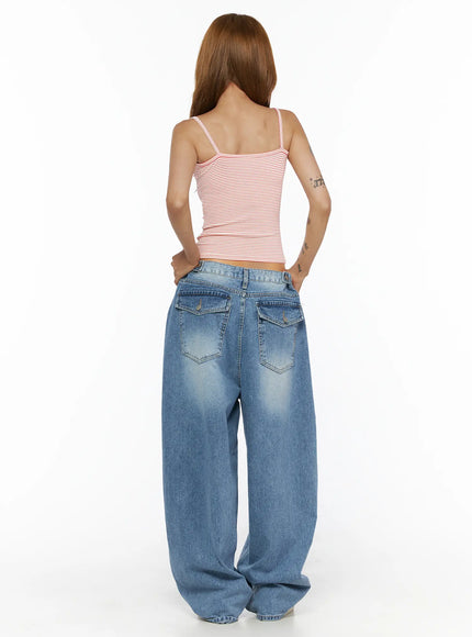 Striped Cami Top CL503 Red back model shot, red and white striped crop cami showing open back and double spaghetti straps, paired with wide-leg blue denim jeans