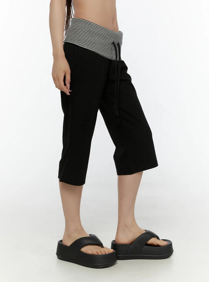 Striped Capri Pants CL508 Black side shot on model showing cropped wide-leg silhouette striped fold-over waistband and platform sandals