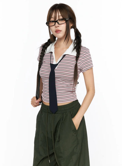 LEWKIN Striped Collared Crop Top Tee CL514 Pink S/M front shot on model wearing glasses and twin braids with navy tie and dark green wide-leg pants