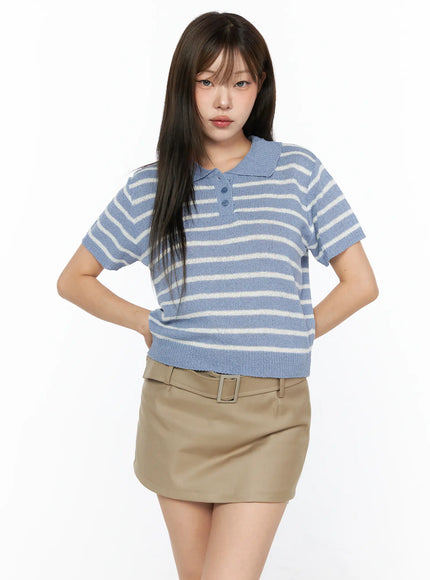 Striped Collared Knit Short Sleeve Top CL514 Blue front shot on model with hands on hips, blue and white horizontal stripe knit polo collar top