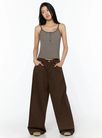 Striped Henley Tank Top IL509 Brown full-length front model shot, hands in pockets, looking upward, cropped cami styled with wide-leg brown trousers