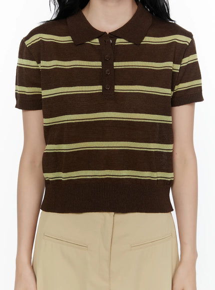 Striped Knit Polo Top CL520 Dark brown detail close-up on model torso showing yellow-green stripe pattern polo collar dark buttons and ribbed hem knit fabric