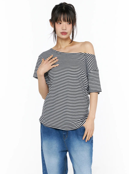 Striped Off-Shoulder Top CU530 Black front close-up on model showing wide off-shoulder neckline and short flutter sleeve, black and white stripe knit fabric