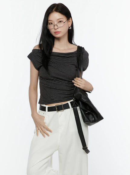 LEWKIN Striped Off-Shoulder Top IL506 Dark gray front model shot styled with white wide-leg pants and black bag, ruched knit fabric S/M