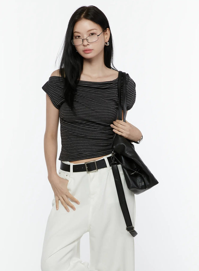 LEWKIN Striped Off-Shoulder Top IL506 Dark gray front model shot styled with white wide-leg pants and black bag, ruched knit fabric S/M