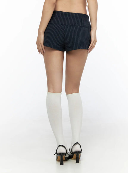 Striped Pocket Shorts CL528 navy back view close-up on model showing clean back panel pinstripe pattern low-rise cut and white knee-high socks