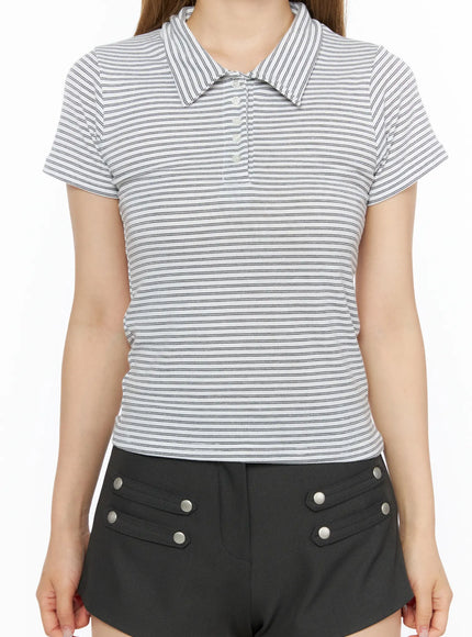 Striped Slim Fit Polo Shirt CL502 White close-up front model shot, detail of polo collar, button placket, and fine horizontal stripe rib-knit texture, paired with black shorts